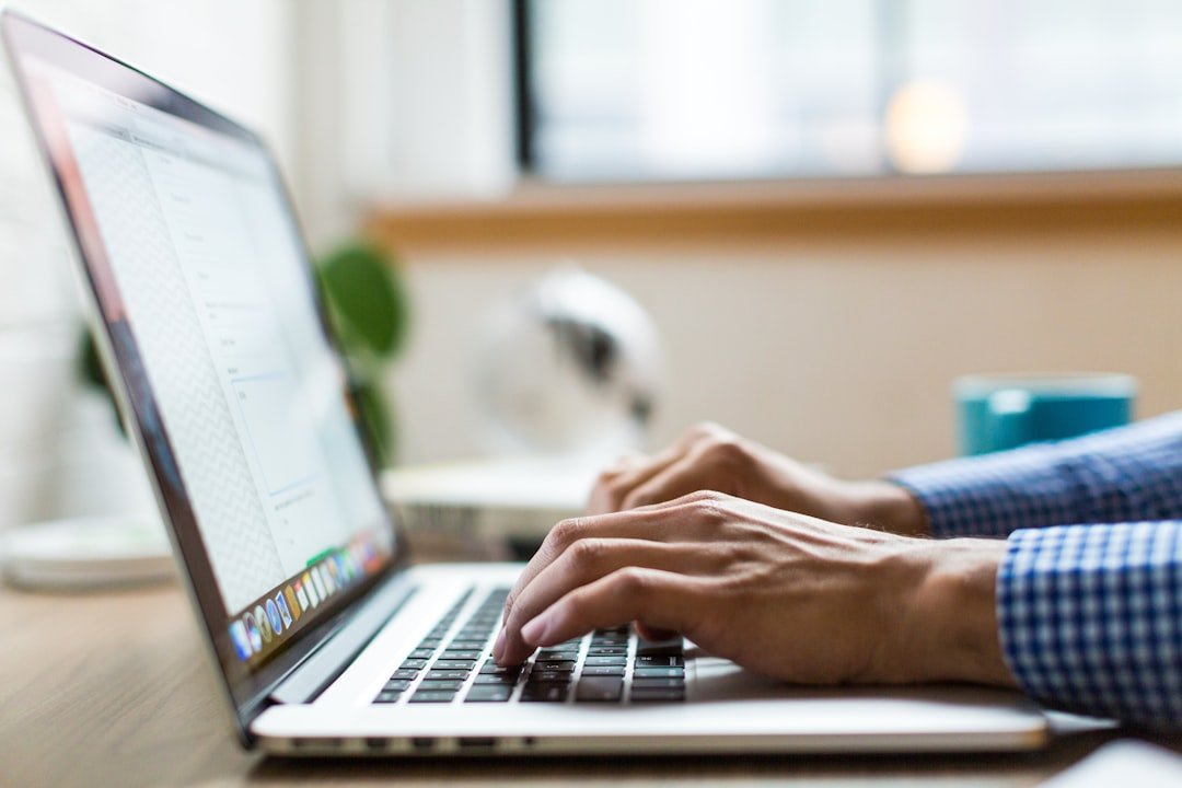 person typing email subscription form